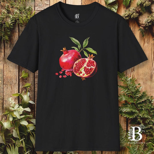 Black t-shirt with pomegranate design on a wooden background