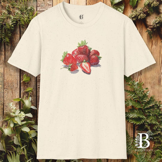 Beige t-shirt with strawberry design on a wooden background