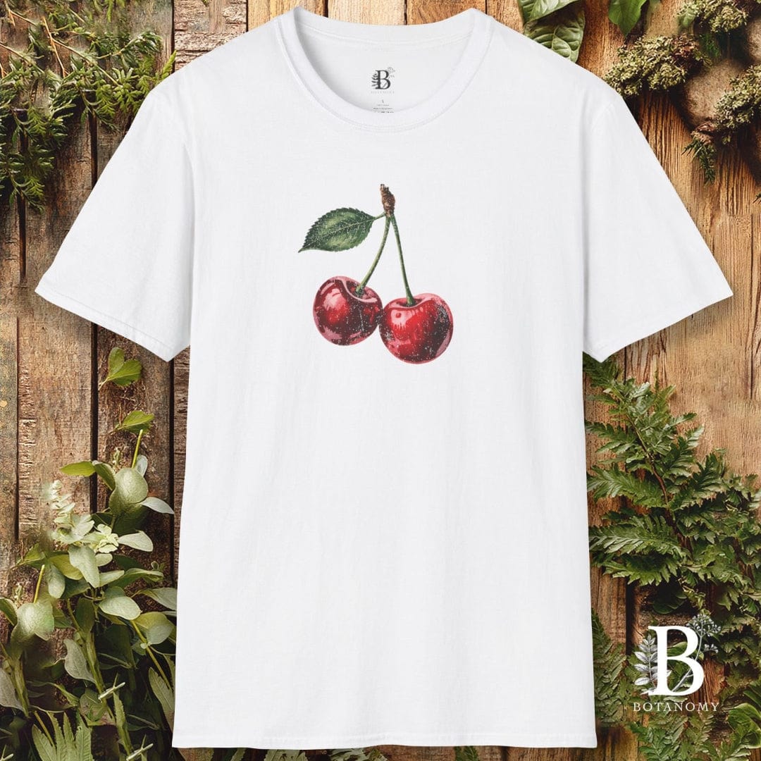 White t-shirt with cherry design on a wooden background