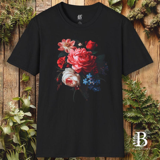 Black t-shirt with floral design on a wooden background