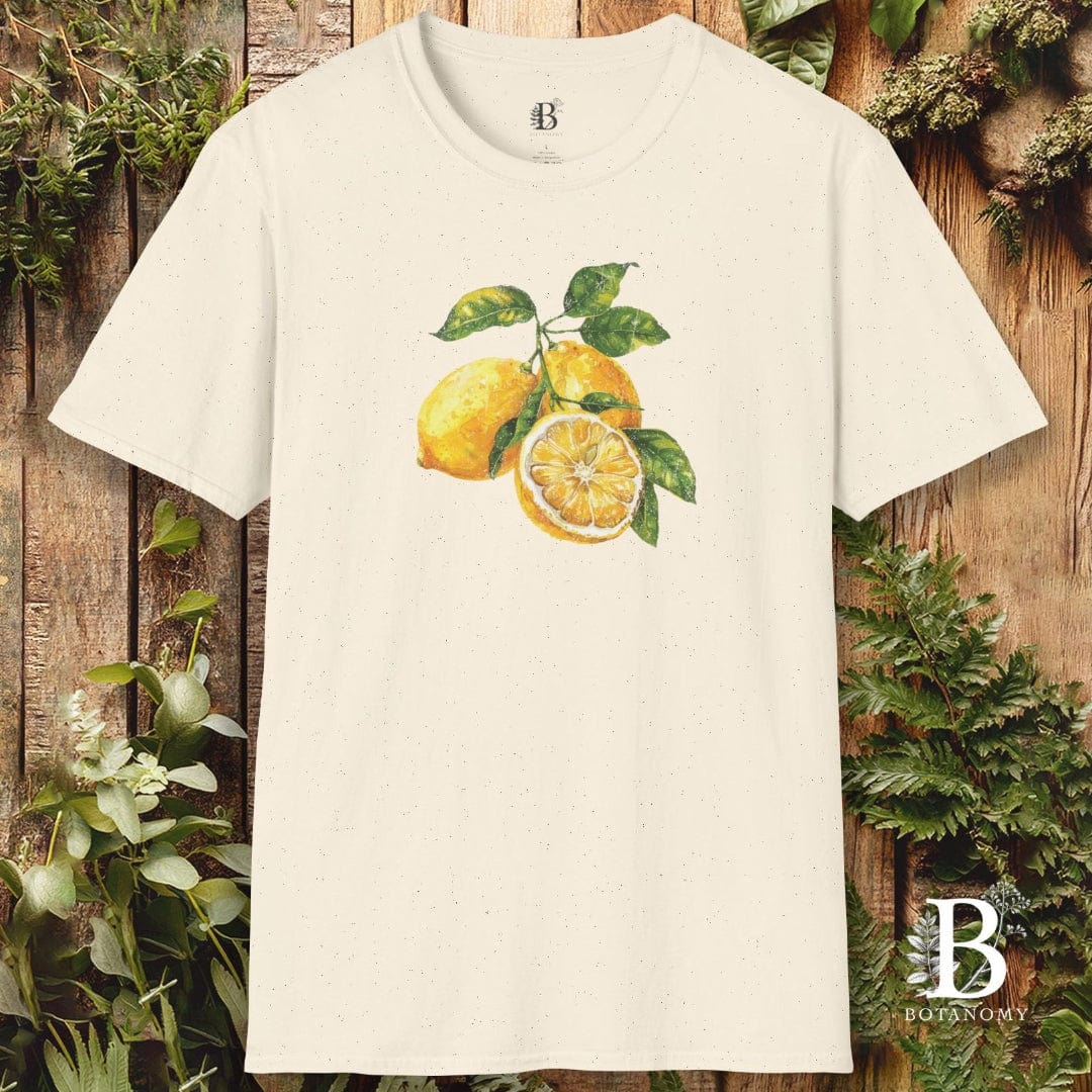 Beige t-shirt with lemon design on a wooden background