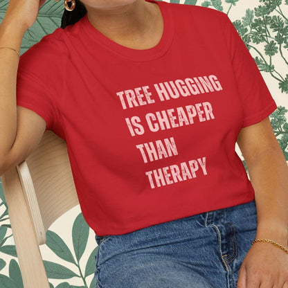 Woman wearing red t-shirt with text: Tree hugging is cheaper than therapy