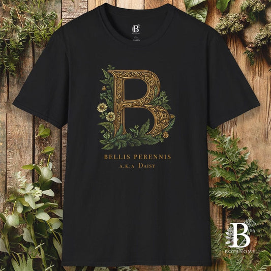 Black t-shirt with floral letter 'B' design on a wooden background