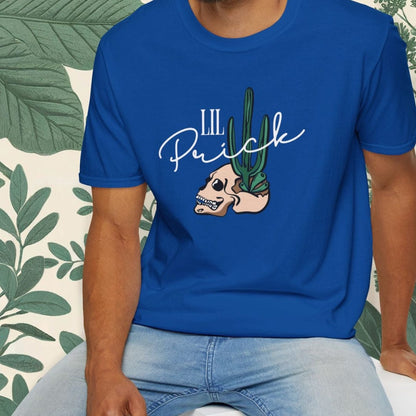 Man wearing a blue t-shirt with a graphic design sitting on a white stool.