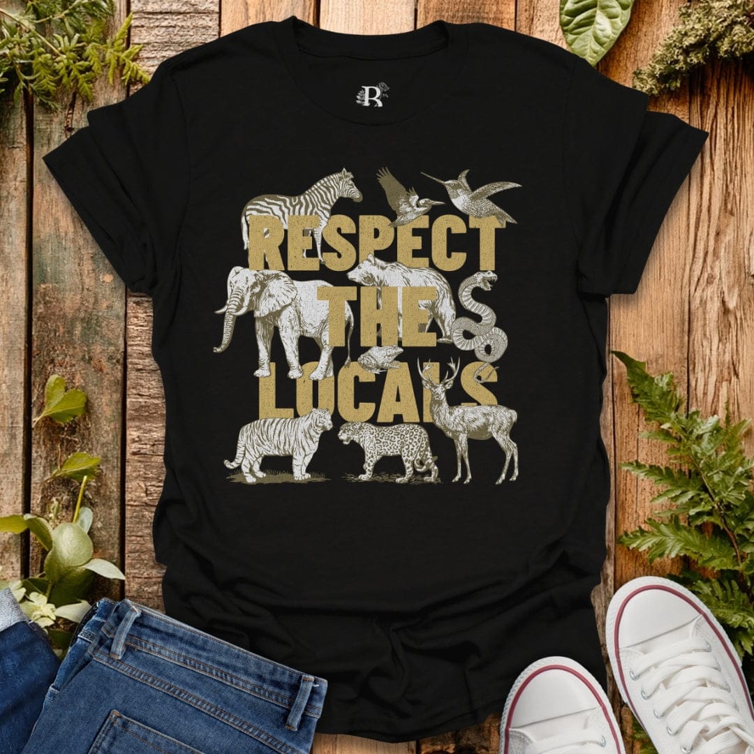 Black t-shirt with animal graphics and 'Respect the Lucals' text on a wooden background