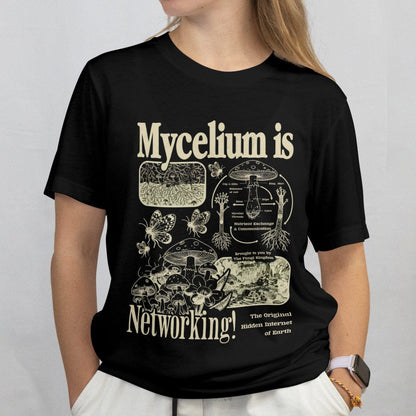 woman wearing a black t-shirt with Mycelium is Networking text and mushroom graphics.