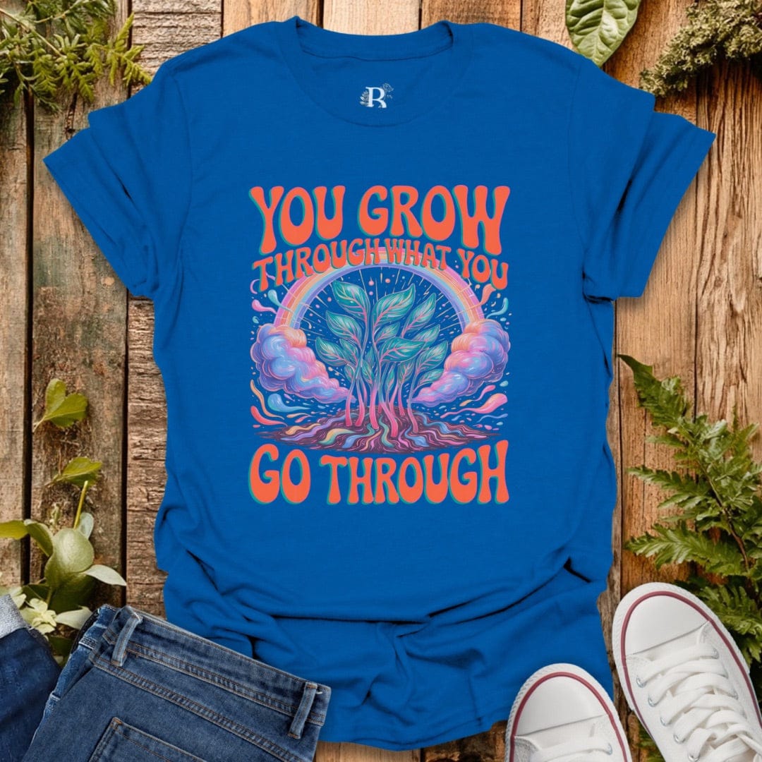 Royal blue “you go through what you go through” message graphic tee.